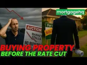 A man looking stressed with text on top "Buying property before the rate cut". Indicating that the video is for NZ property investors