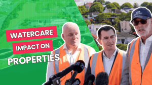 Auckland Watercare workers speaking at a press conference, with text on screen "watercare impact on properties"