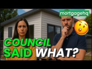 A man and woman standing next to each other looking serious, with text on screen "council said what?". This video is about granny flats