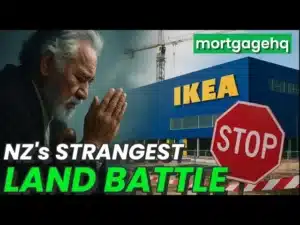A man praying with an IKEA store in the background. Text on screen 'NZ's strangest land battle'