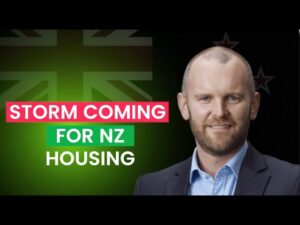A man smiling with text next to him "Storm coming for NZ housing"