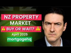 A man with a stern expression looking into the camera with text next to him "NZ property market buy or wait April 2025"