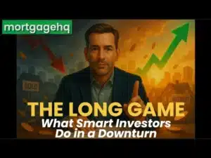 A man looking into the camera with text on top "The long game what smart investors do in a downturn", indicating this video is about property prices