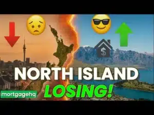 Sad emoji on the left, happy emoji on the right. Text on screen "North Island Losing!", indicating the North Island in NZ is losing the property investing war
