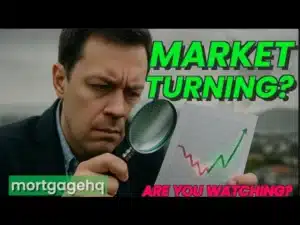 A man looking into a magnifying glass with text next to him "Market turning?"