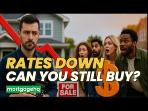 People looking shocked at a man with text underneath him "Rates down can you still buy?"