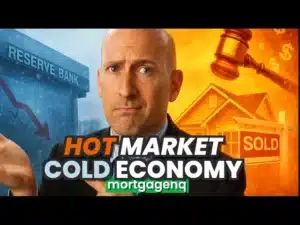 A man looking concerned with text underneath him "hot market cold economy", indicating the status of the NZ property market