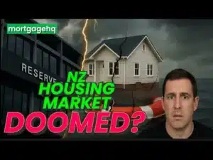 A man looking shocked with text next to him "NZ housing market doomed?"
